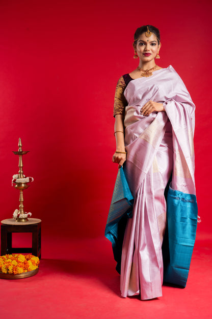 Shrivvi Baby Pink Silk Saree With Blue Border