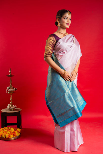 Shrivvi Baby Pink Silk Saree With Blue Border