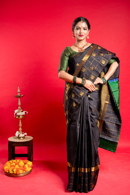 Shrivvi Black Silk Saree With Green Border