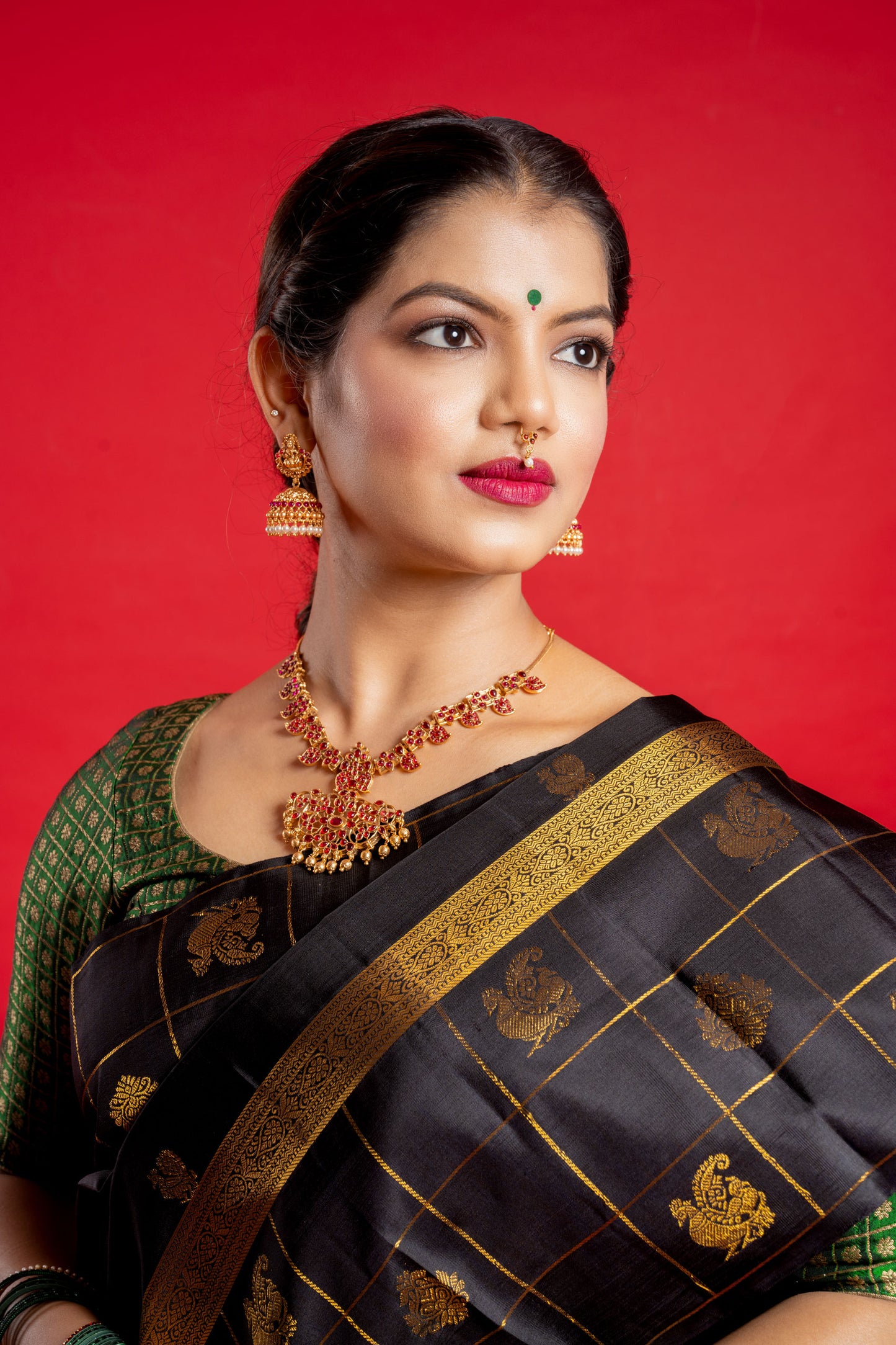 Shrivvi Black Silk Saree With Green Border