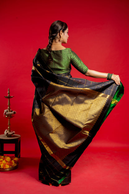 Shrivvi Black Silk Saree With Green Border