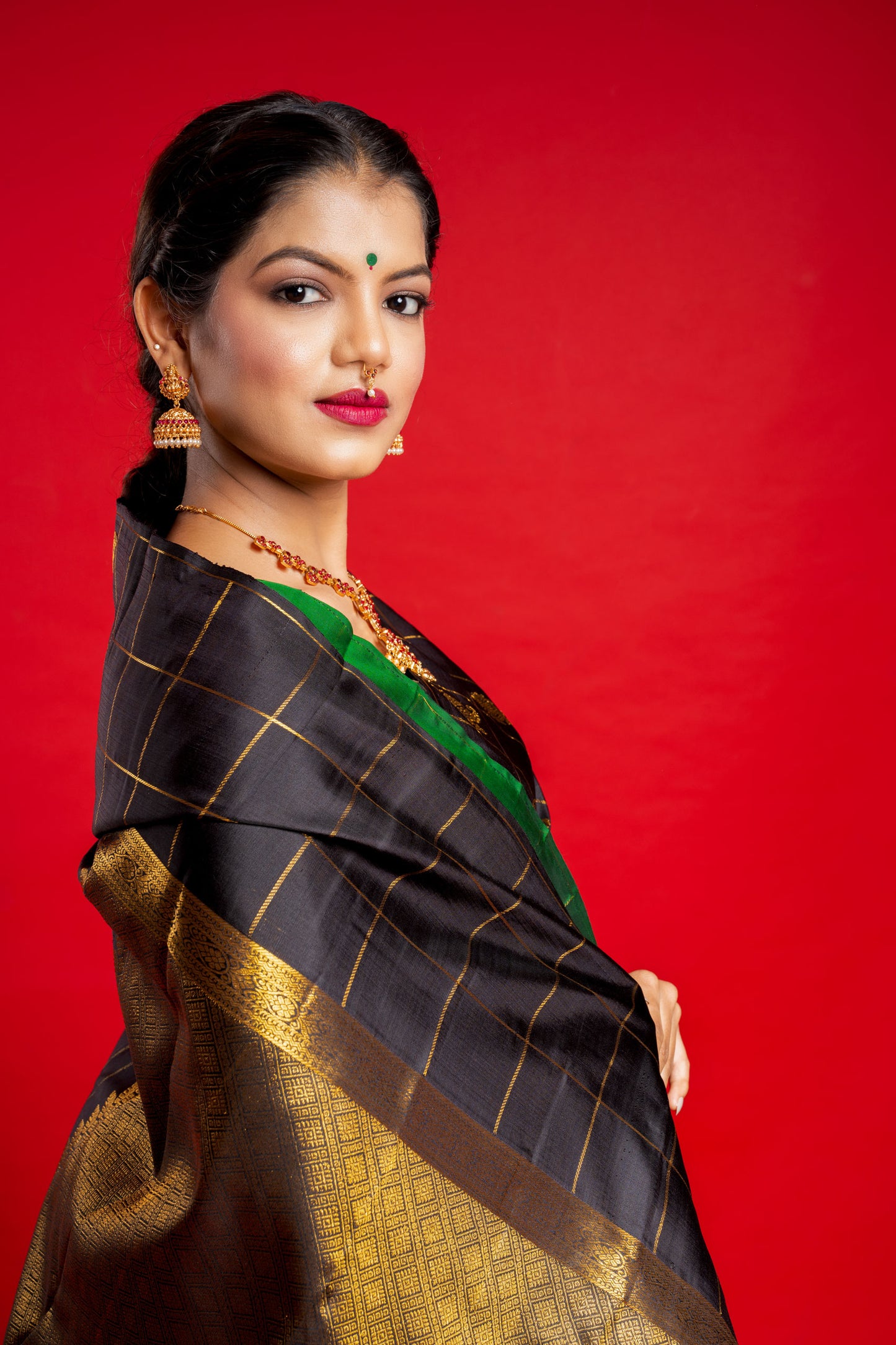 Shrivvi Black Silk Saree With Green Border