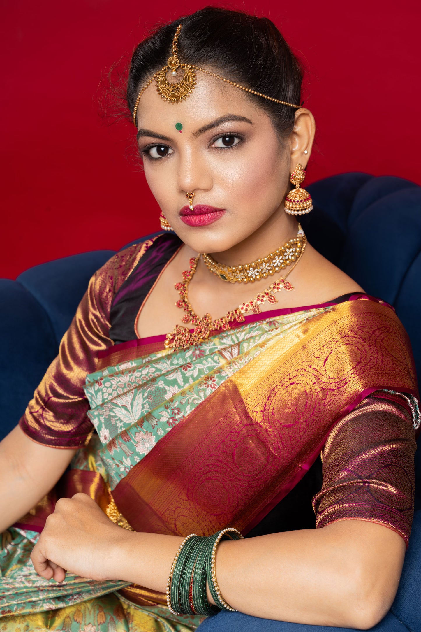 Shrivvi Floral Green Silk Saree With Red Border