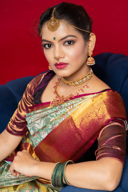 Shrivvi Floral Green Silk Saree With Red Border