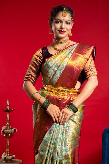 Shrivvi Floral Green Silk Saree With Red Border