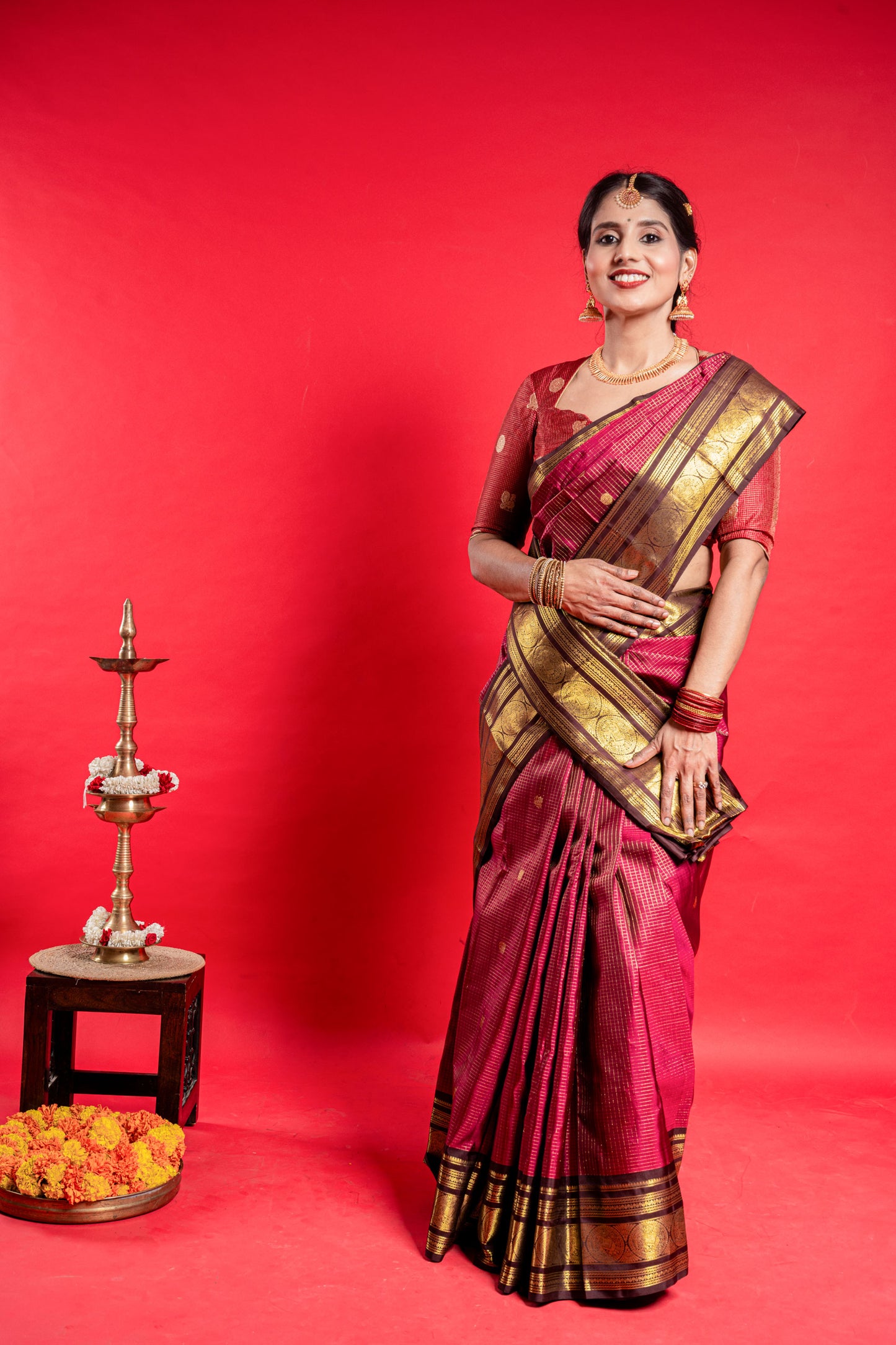 Shrivvi Maroon Silk Saree With Brown Border