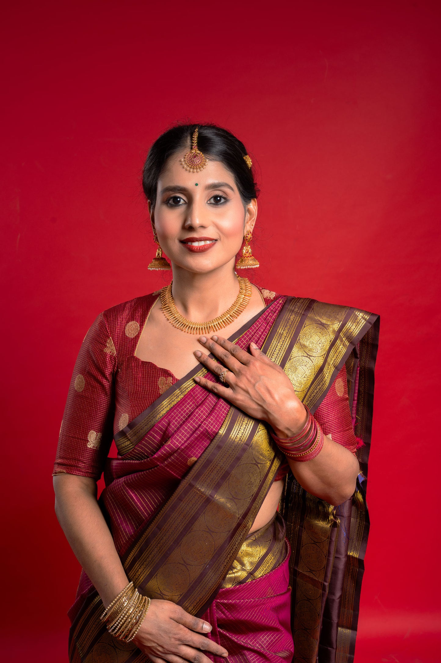 Shrivvi Maroon Silk Saree With Brown Border