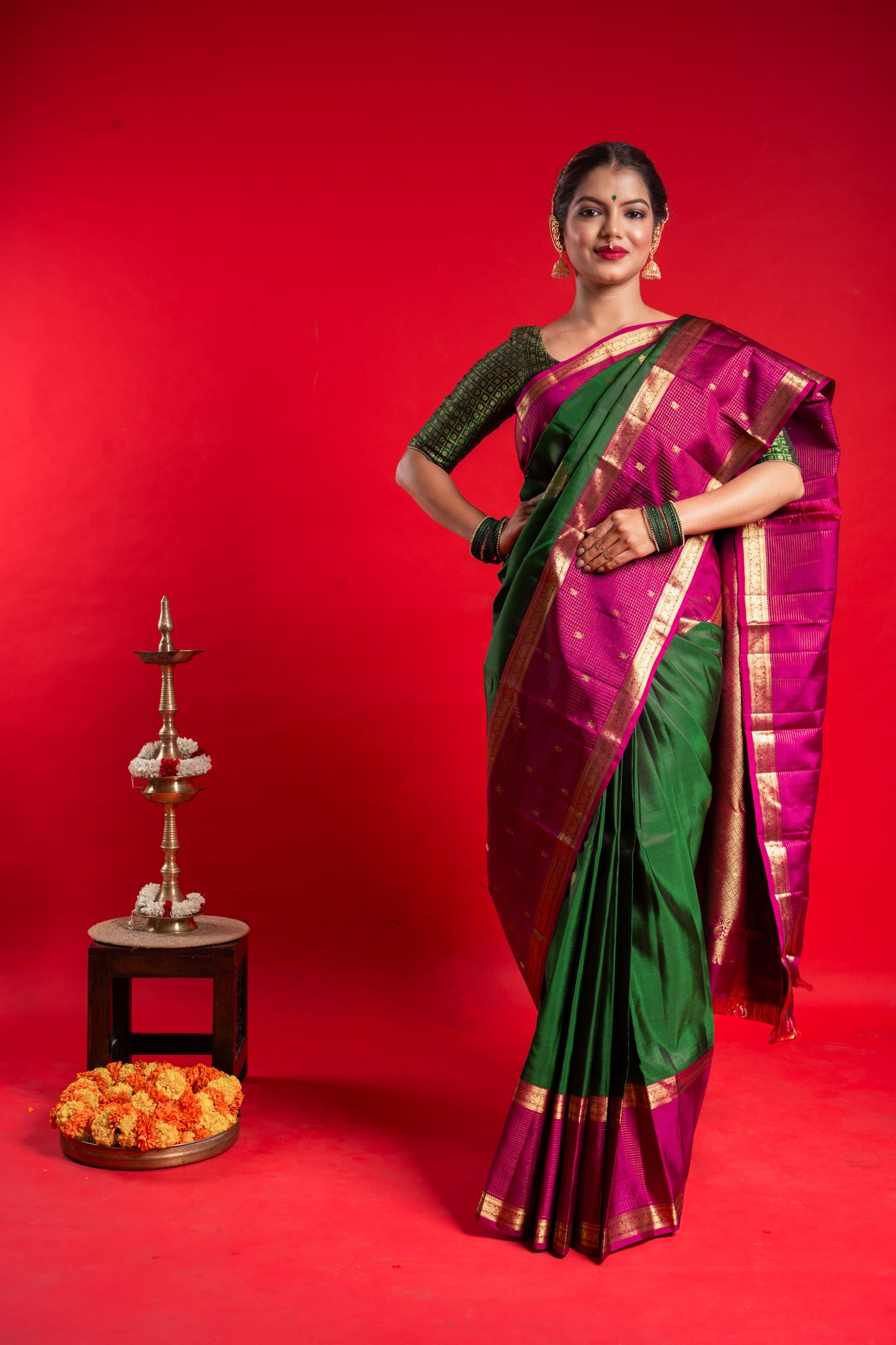 Shrivvi Green Silk Saree With Pink Border