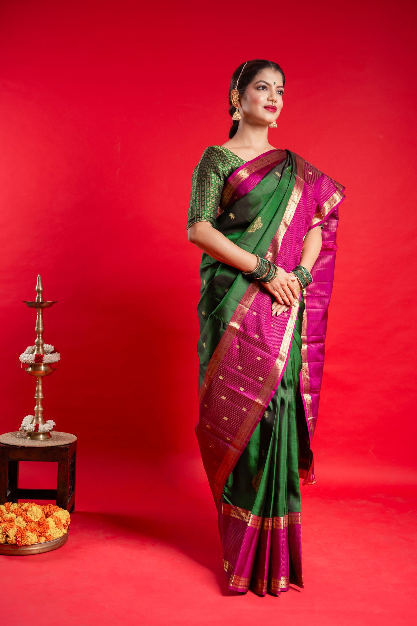 Shrivvi Green Silk Saree With Pink Border