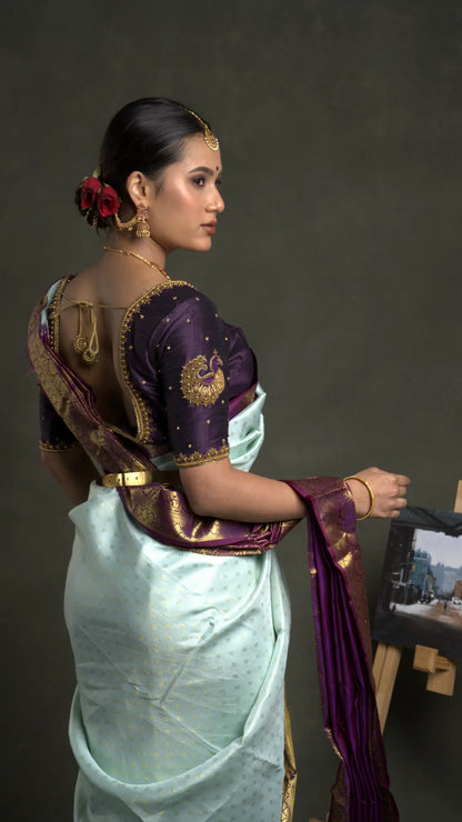 Shrivvi Elegant Light Blue Silk Saree with Purple Golden Zari Border