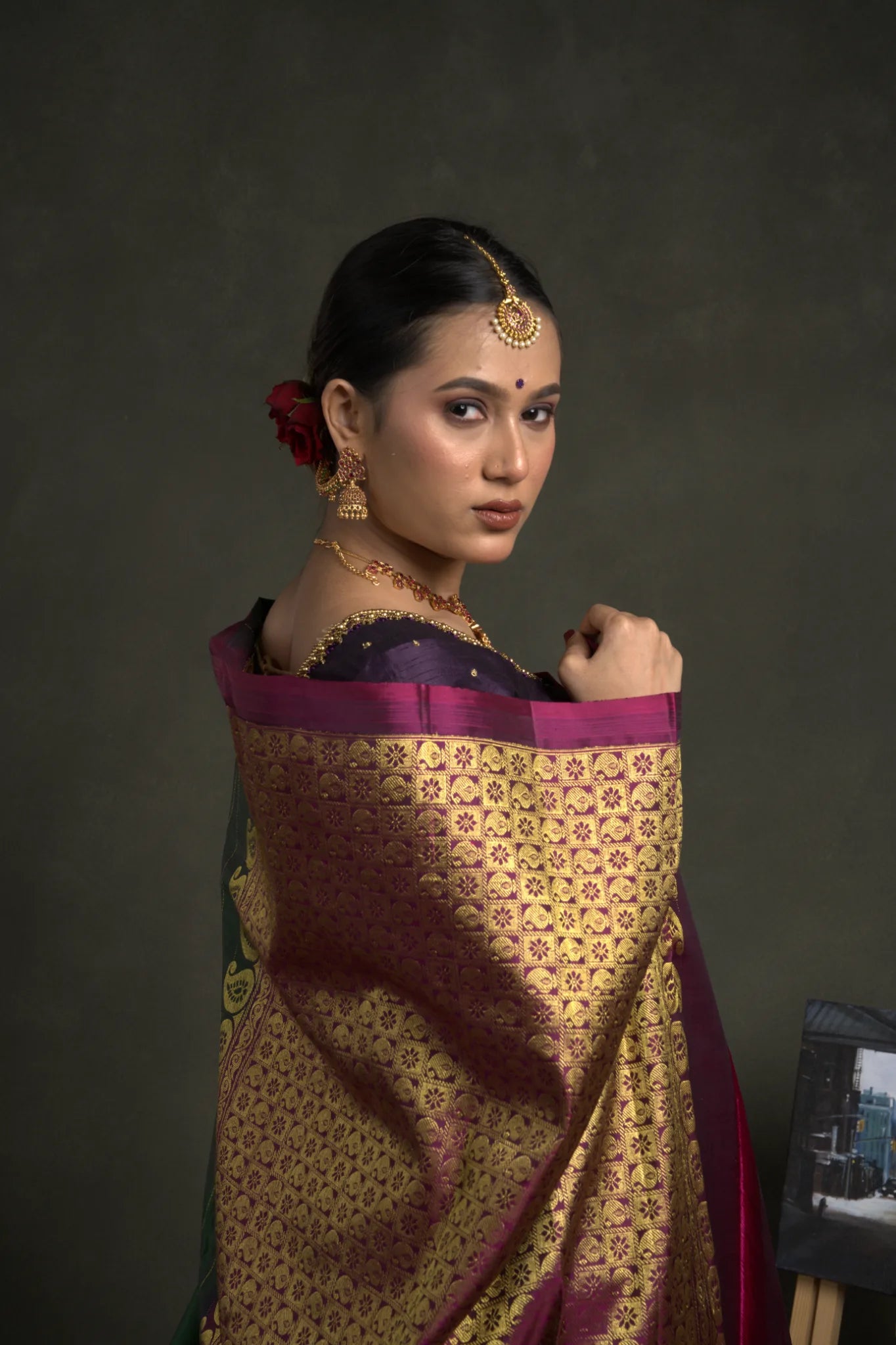 Shrivvi Graceful Green Silk Saree with Purple Square Golden Zari Border