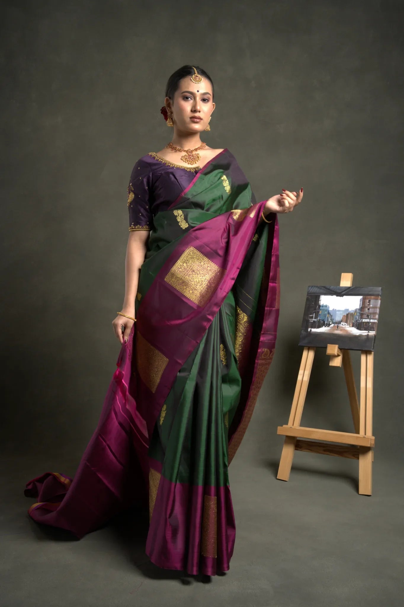 Shrivvi-graceful-green-silk-saree-with-purple-square-golden-zari-border