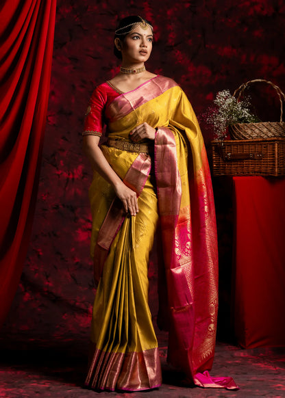 Shrivvi Haldi Silk Saree With Pink Border